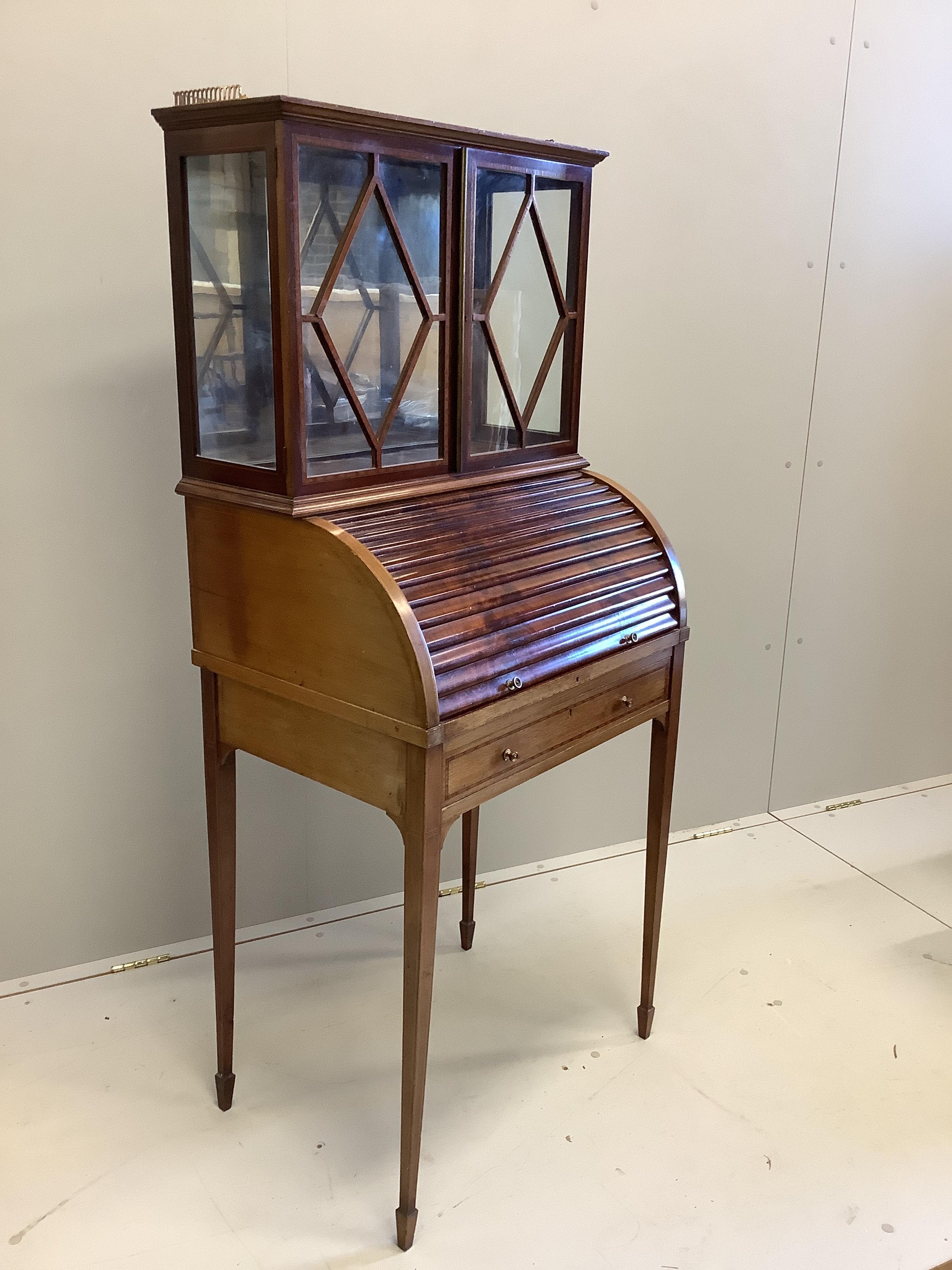 A small Edwardian satinwood banded mahogany cylinder bureau bookcase, width 64cm, depth 47cm, height 151cm